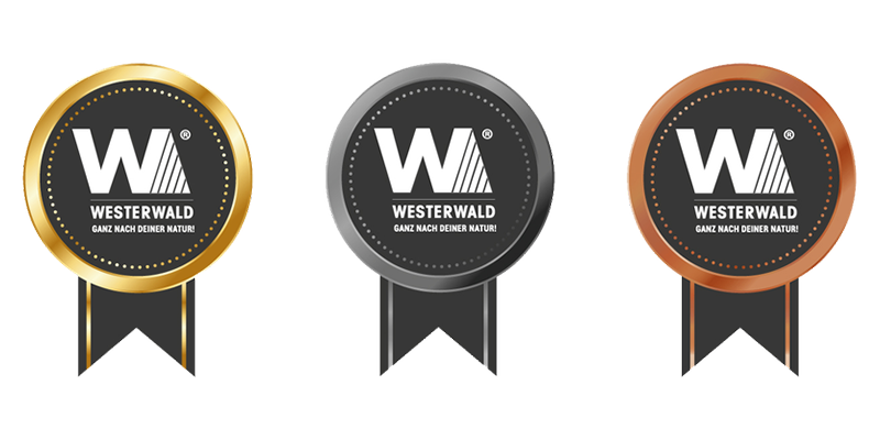 Drei Medaillen mit dem Aufdruck WESTERWALD und Logo